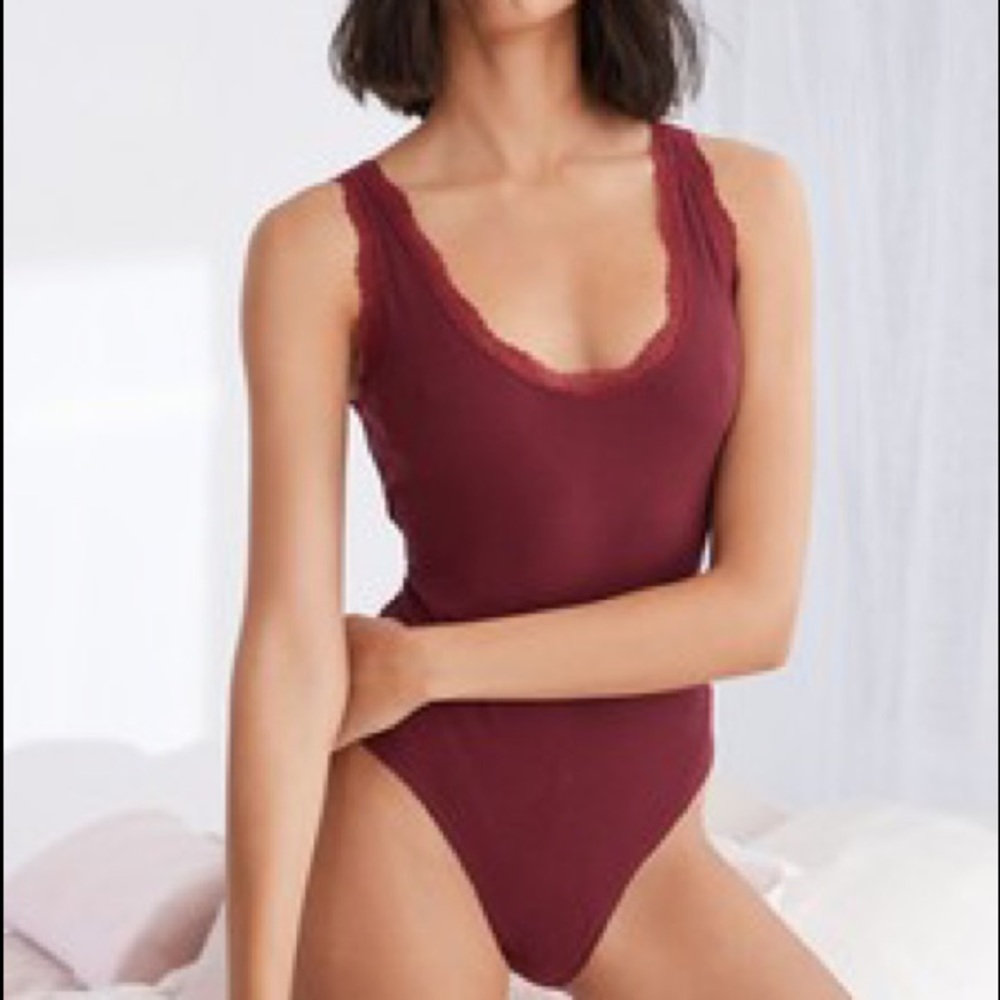 “4/$25” - Black body suit V neck